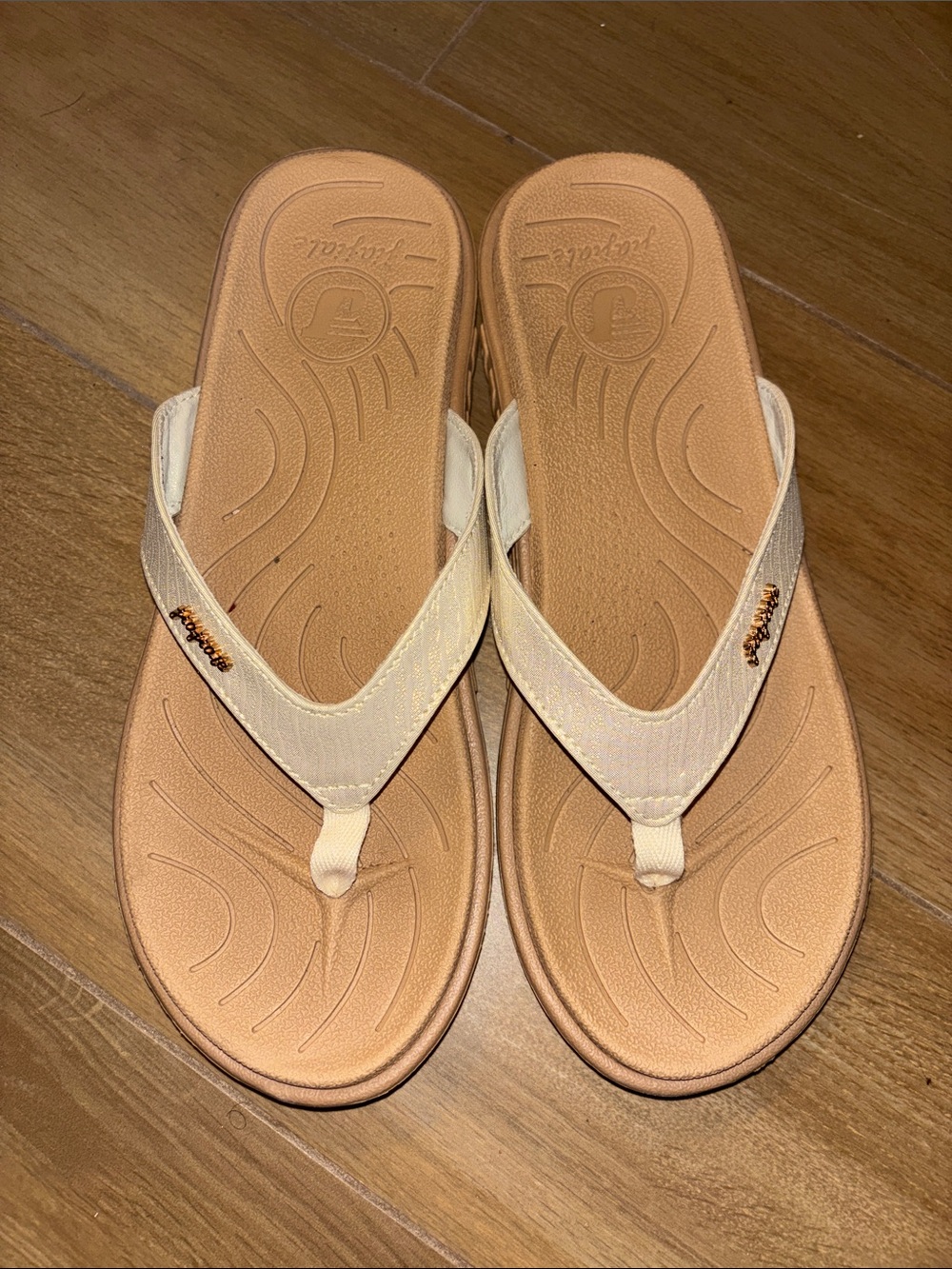 Gold comfy flip flops